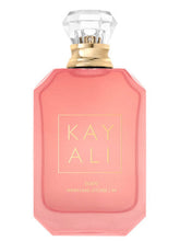 Compare aroma to Eden Sparkling Lychee 39 by Kayali women type 2oz concentrated cologne-perfume spray (women)