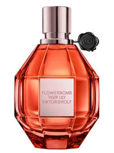 Compare aroma to Flowerbomb Tiger Lily by Viktor & Rolf women type 1/3oz roll-on bottle cologne fragrance body oil. Alcohol-Free (women)