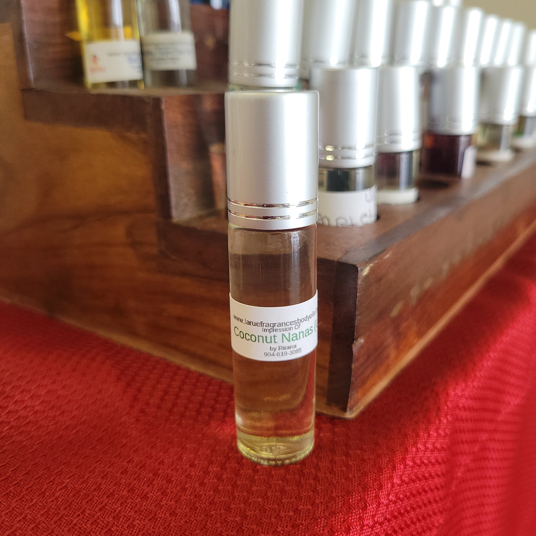 Compare aroma to Coconut Nanas by Rirana men women type 1/3oz roll on bottle perfume cologne fragrance body oil. Alcohol-Free
