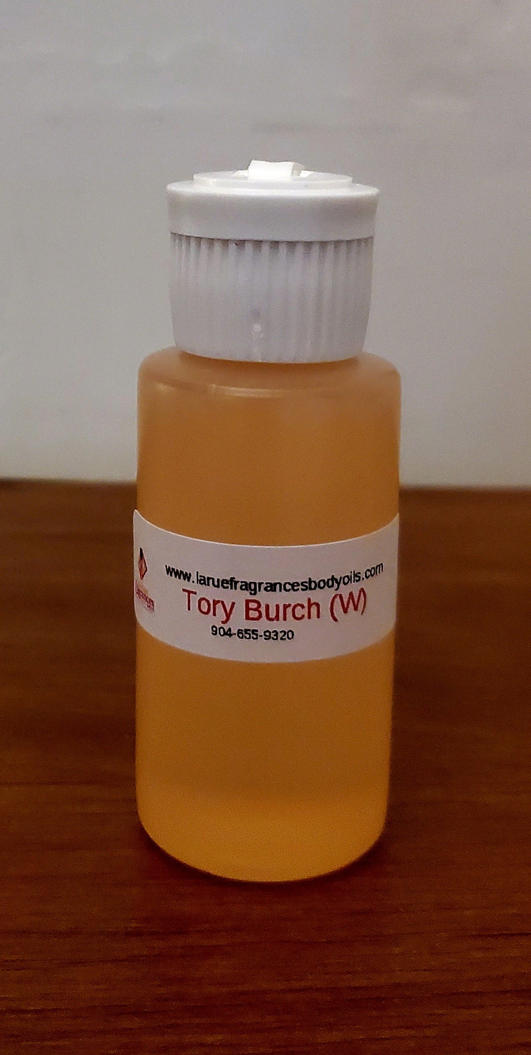 Our Impression of Tory Burch 1oz Women Flip Top Bottle