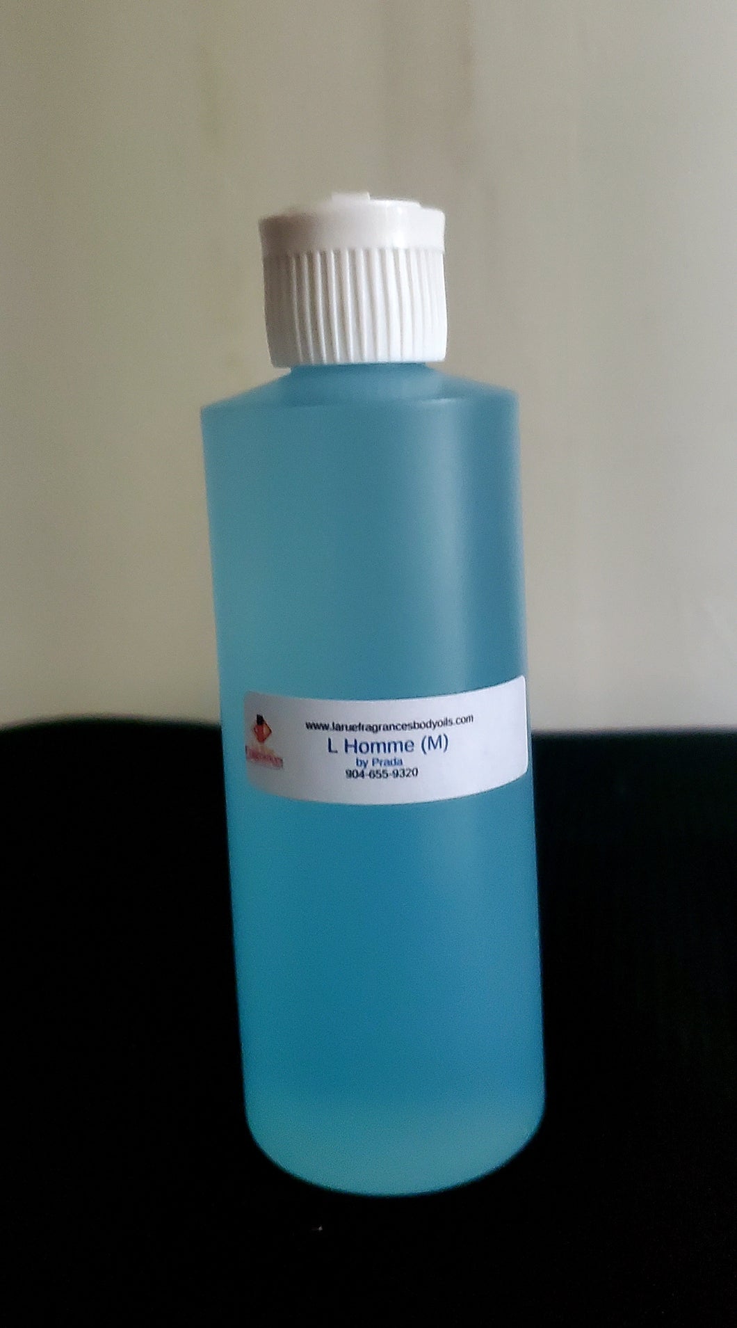 Our Impression of L' Homme Prada 4oz flip top bottle  (Men)